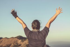 person raising hands